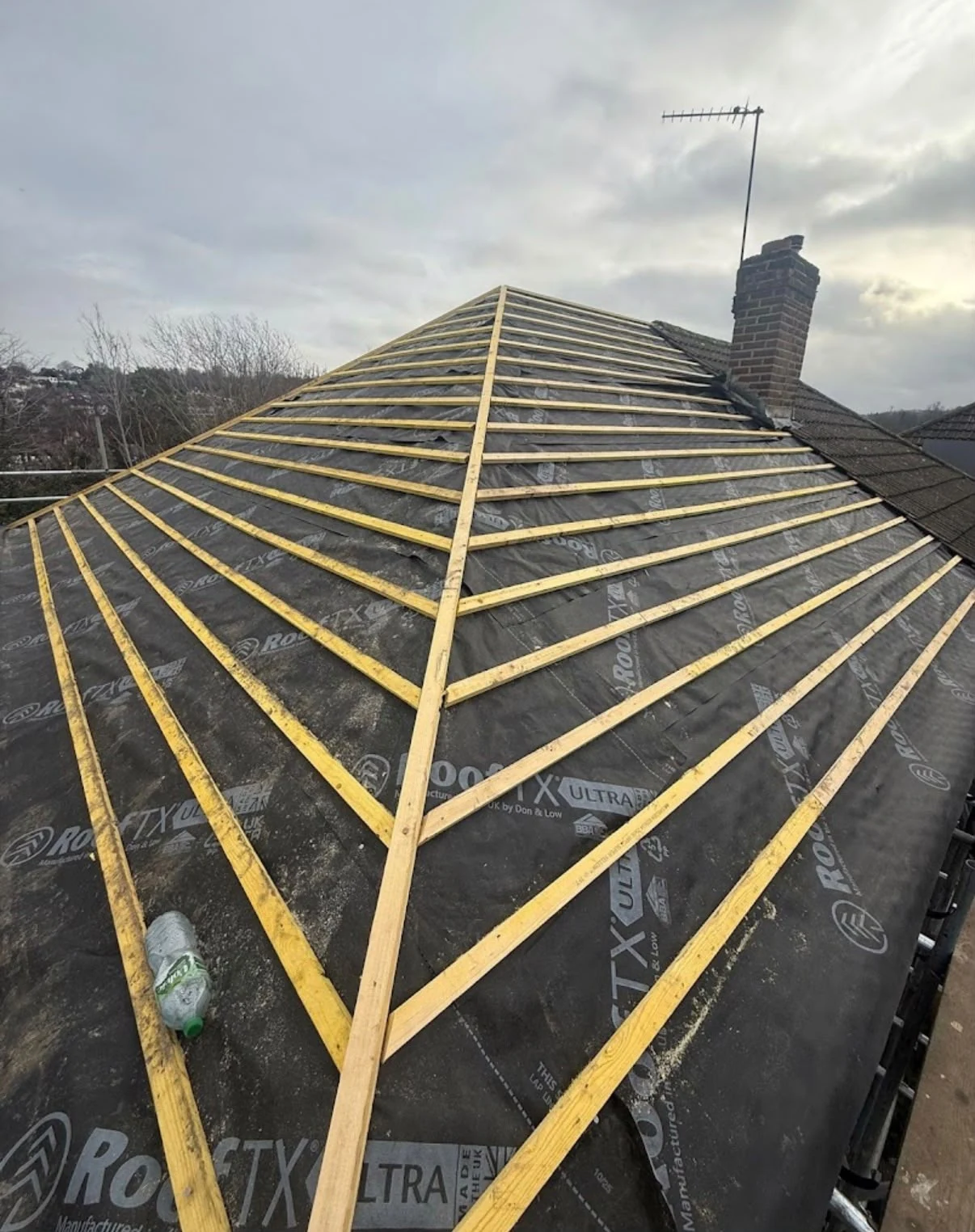 Roofing membrane and timber battens prepared on a pitched roof